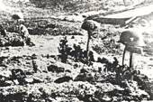 Trois tombes  l'ombre des coupoles exploses : un belge, un Para allemand et un fantassin de la Wehrmacht